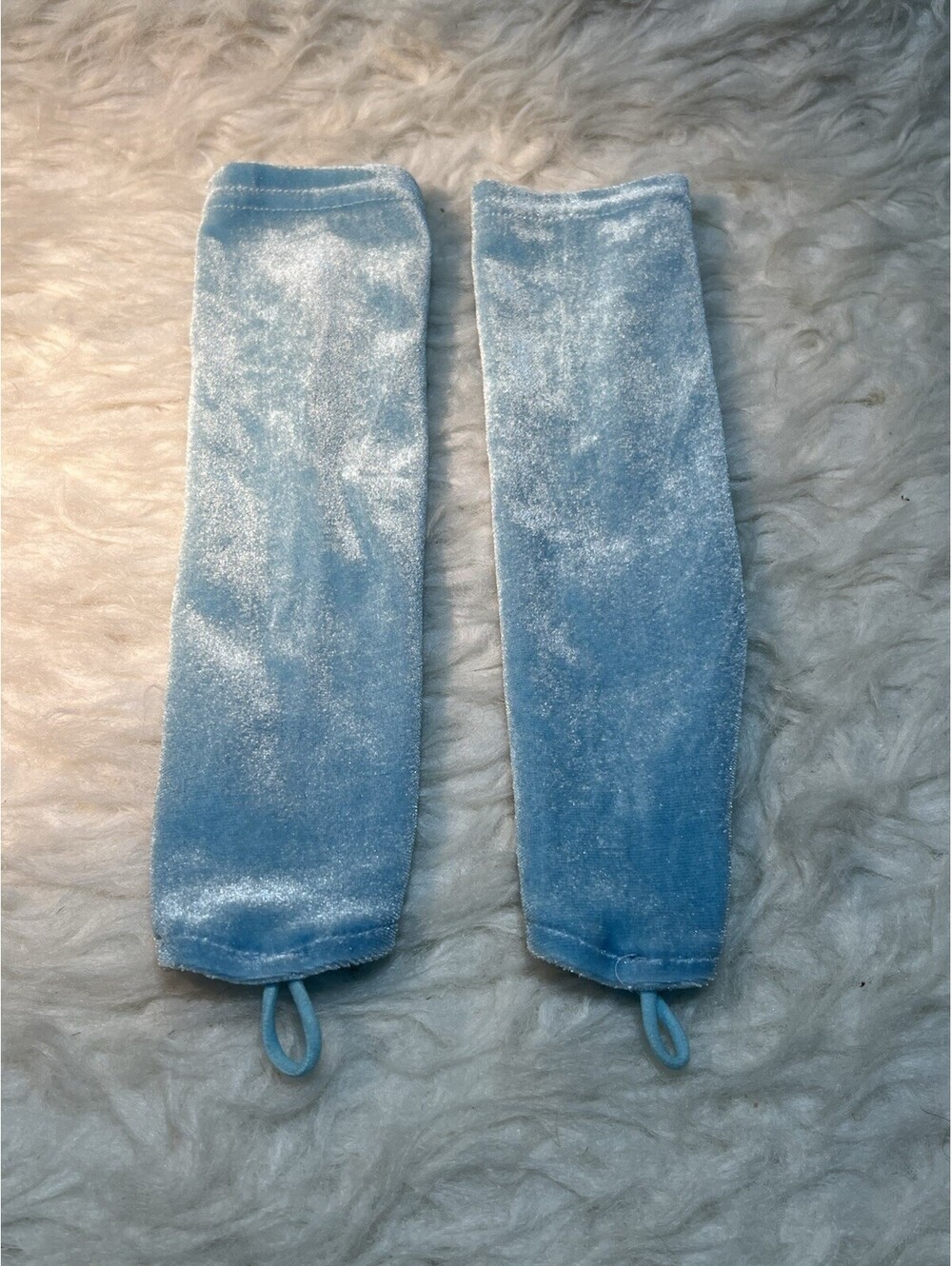 pair of light blue velour costume gloves with finger loops